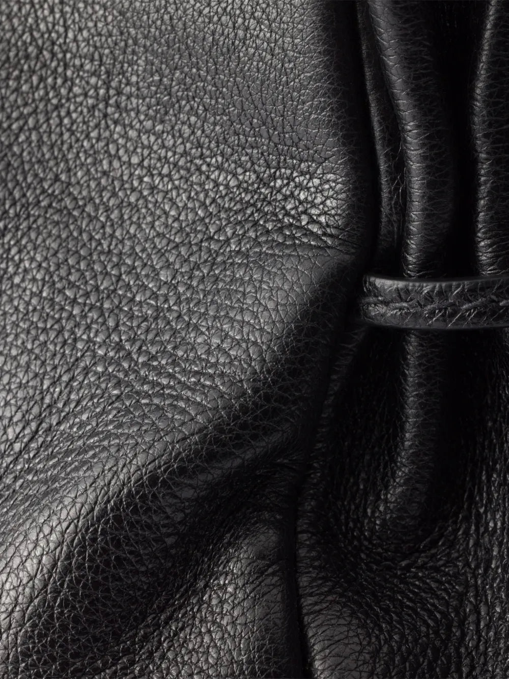 Prada Bonnie Medium Antiqued Leather Tote Bag in Black, angle — The Quiet Edition