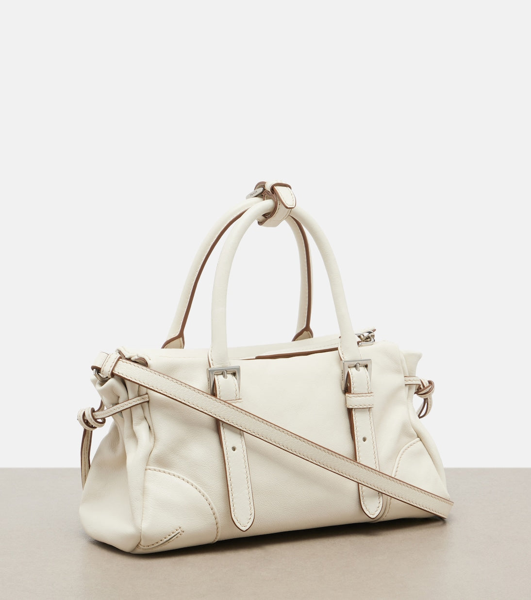Prada Bonnie Small Leather Shoulder Bag in White, angle — The Quiet Edition