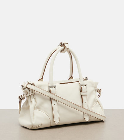 Prada Bonnie Small Leather Shoulder Bag in White, angle — The Quiet Edition