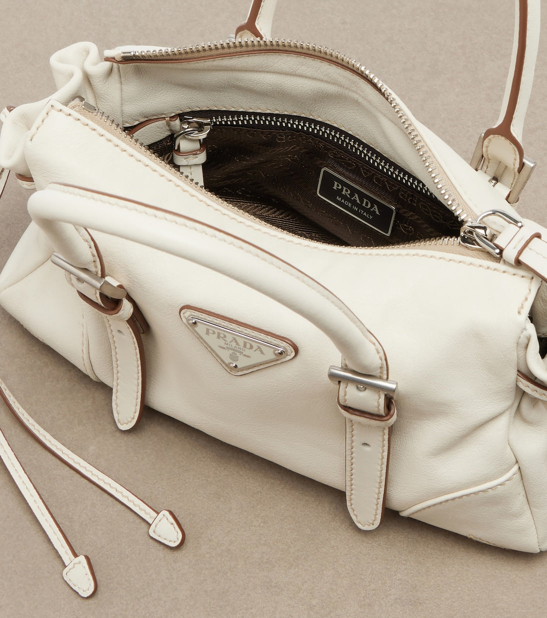 Prada Bonnie Small Leather Shoulder Bag in White, side — The Quiet Edition