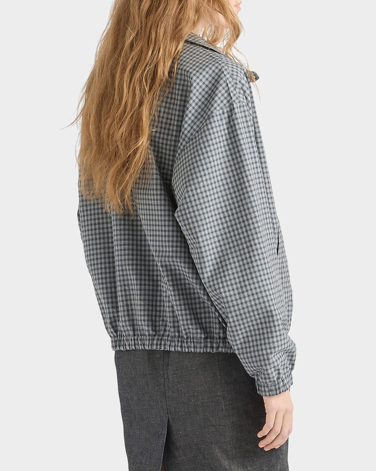 Prada Check Wool-Cotton Shirt Jacket in Grey, worn back view — The Quiet Edition