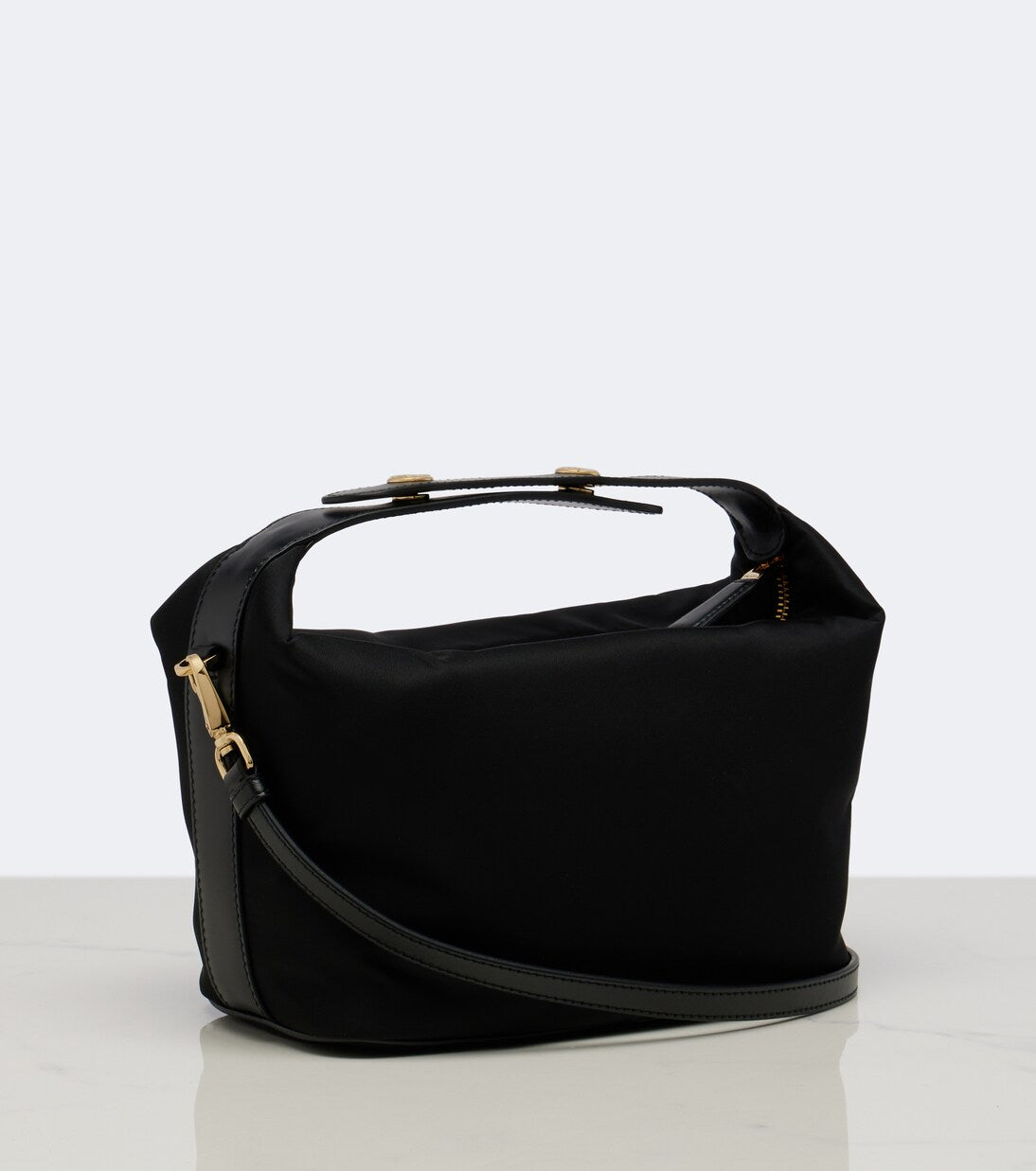Prada Chérie Mini Re-Nylon Bag in Gold Hardware, angle — The Quiet Edition