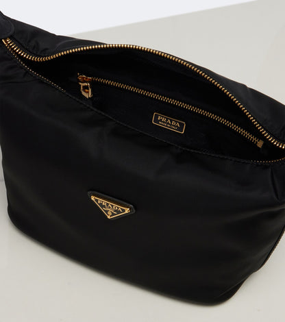 Prada Chérie Mini Re-Nylon Bag in Gold Hardware, side — The Quiet Edition
