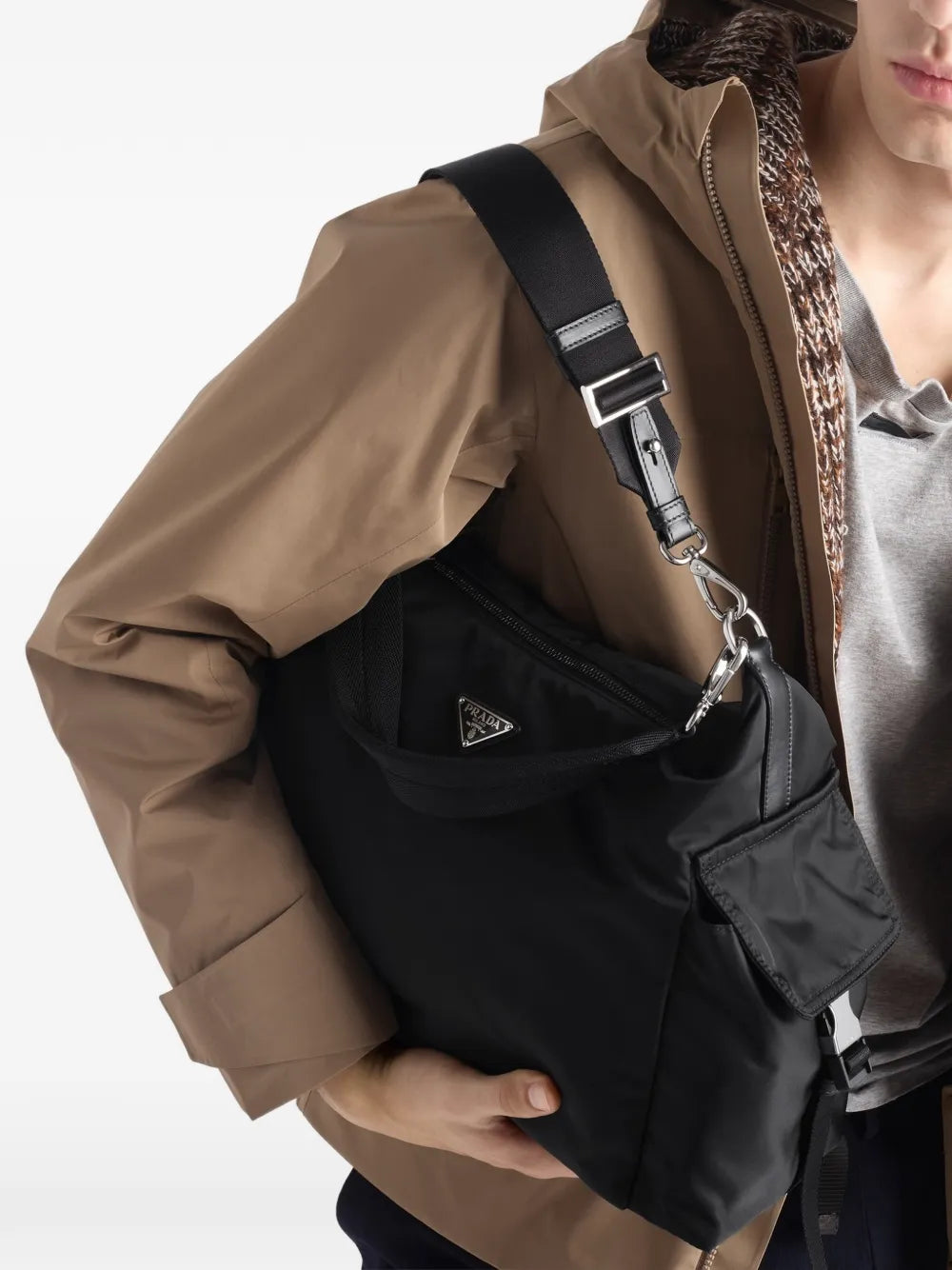 Prada Explore Logo-Plaque Tote Bag in Black, detail — The Quiet Edition