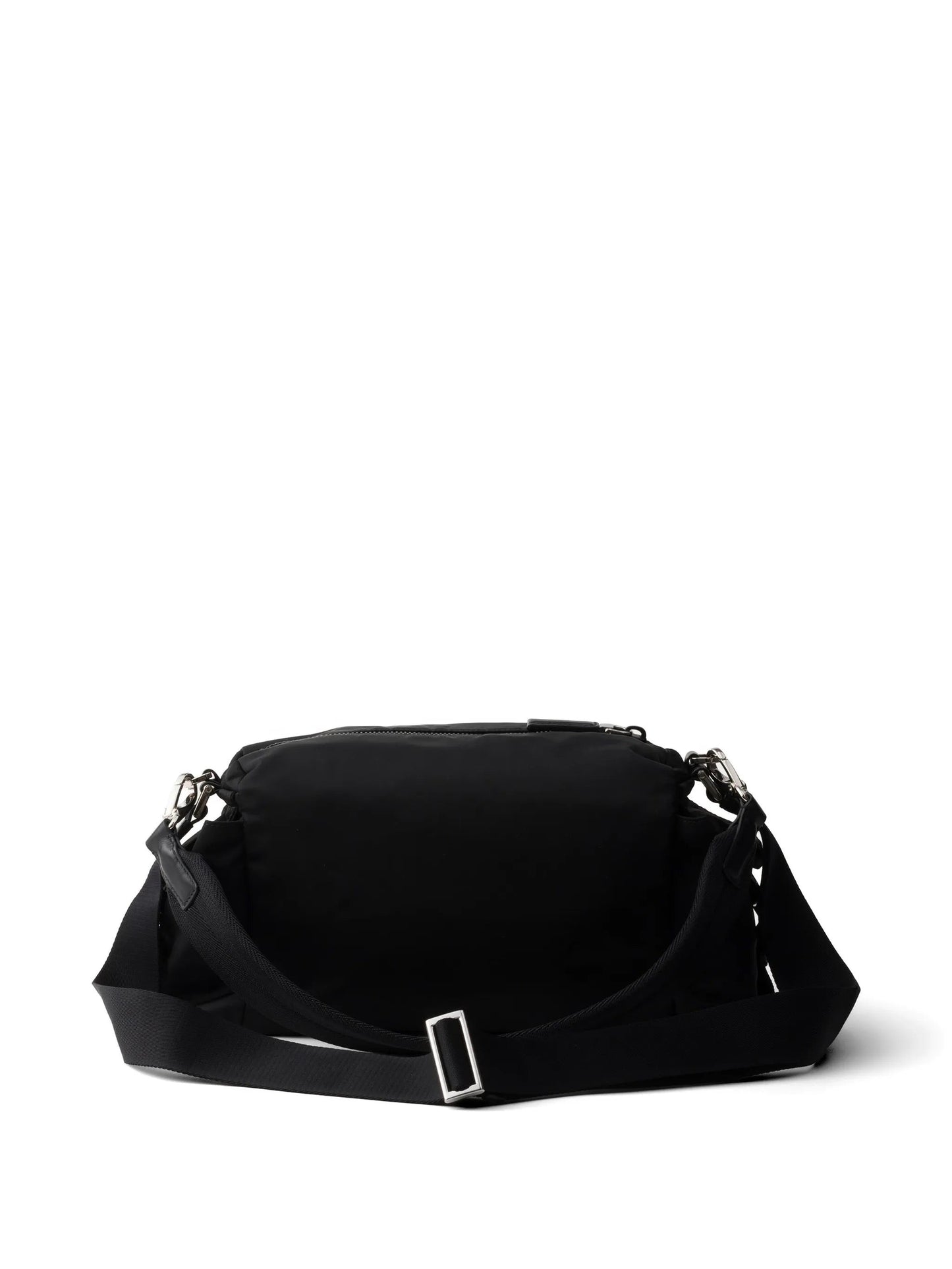 Prada Explore Re-Nylon hobo bag in black, back view with adjustable strap — The Quiet Edition