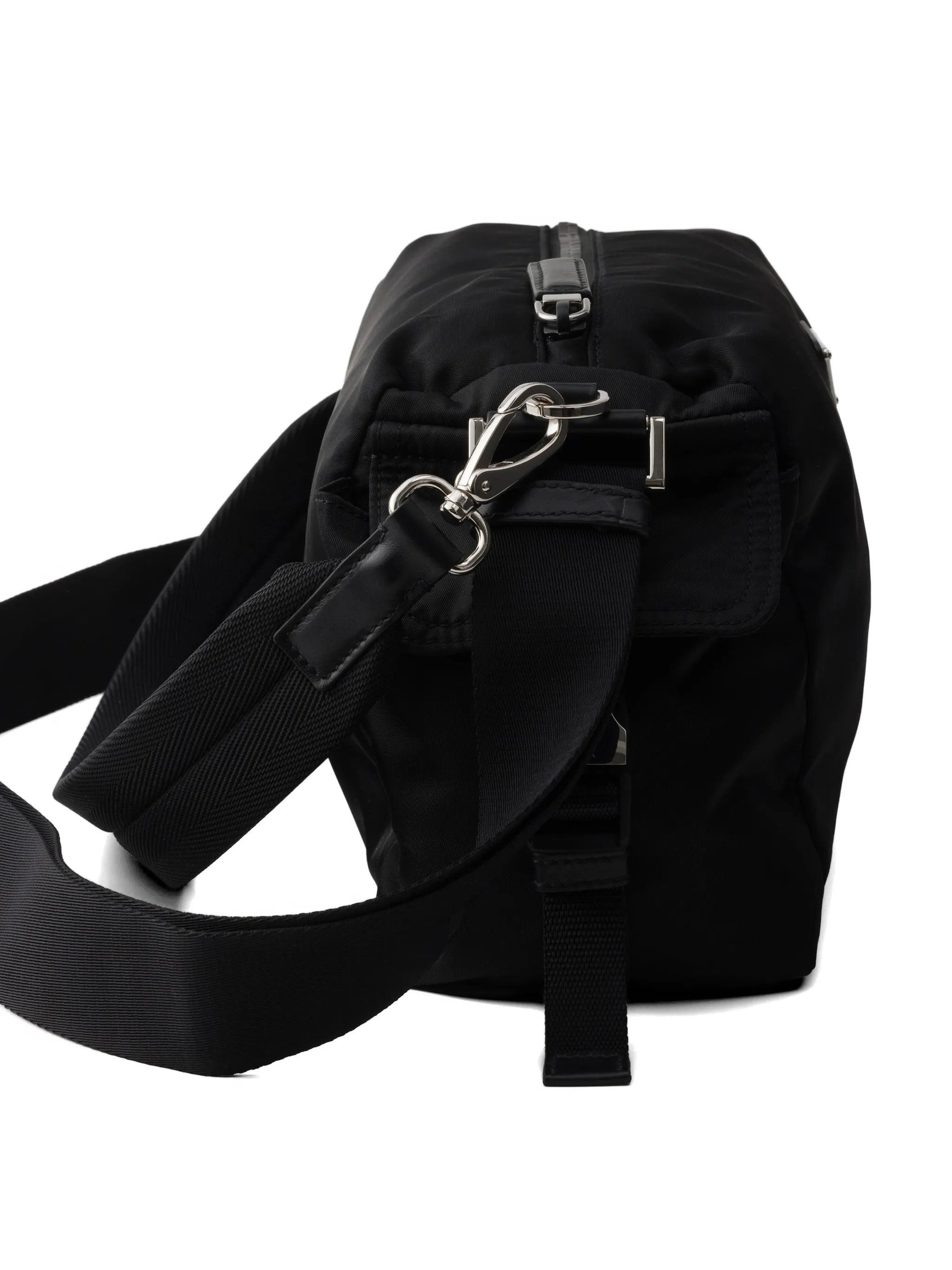 Prada Explore Re-Nylon hobo bag in black, side pocket detail — The Quiet Edition