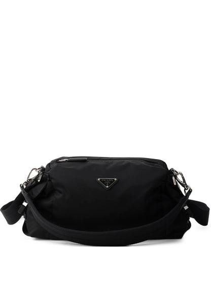 Prada Explore Re-Nylon hobo bag in black, front view with triangle logo — The Quiet Edition