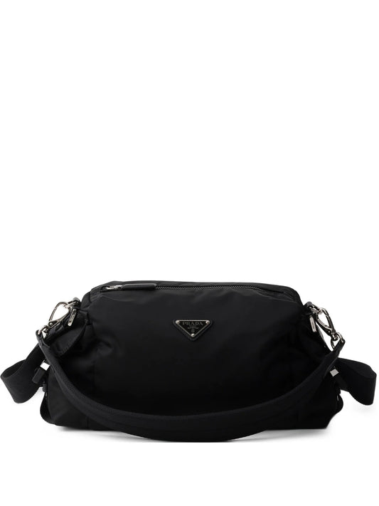 Prada Explore Re-Nylon hobo bag in black, front view with triangle logo — The Quiet Edition