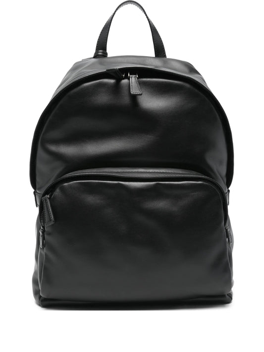 Prada leather backpack in black, front view — The Quiet Edition