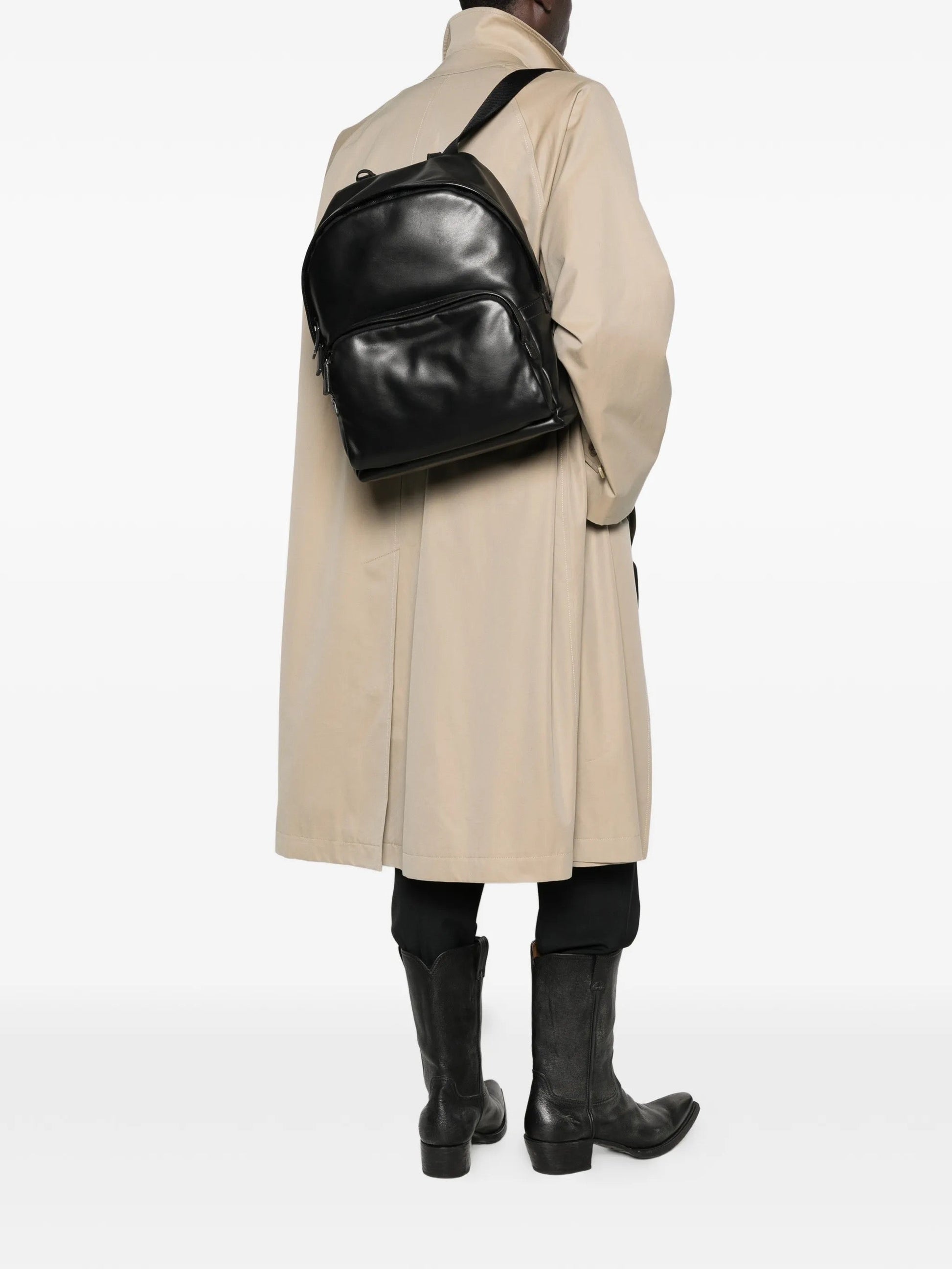 Prada leather backpack in black, model wearing — The Quiet Edition