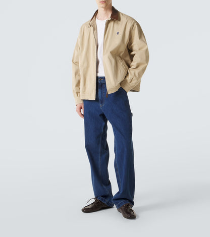 Prada Leather-Trimmed Cotton Blouson Jacket in beige, worn full-length view — The Quiet Edition