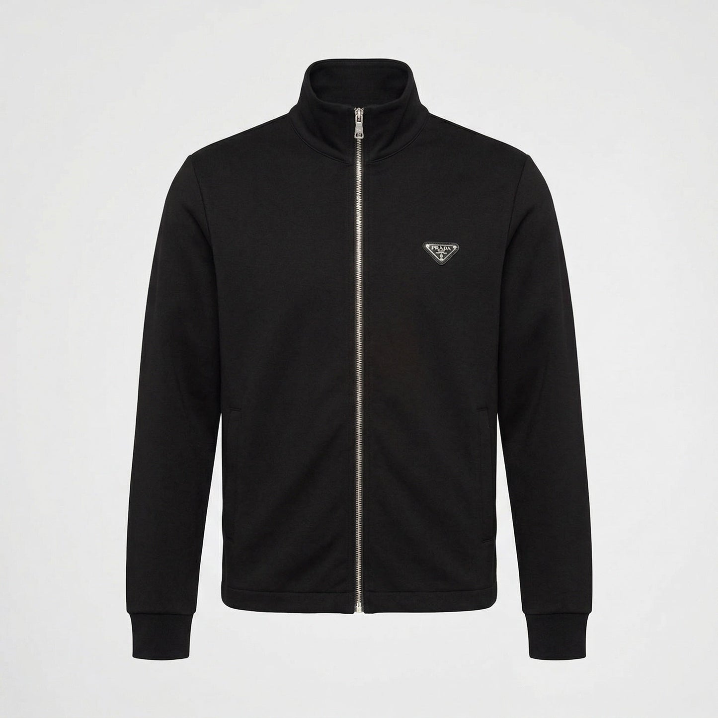Prada logo patch zip cardigan in black, front view — The Quiet Edition