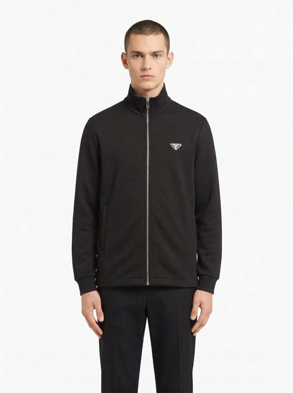Prada logo patch zip cardigan in black, model front — The Quiet Edition