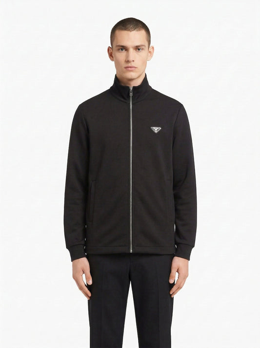 Prada logo patch zip cardigan in black, model front — The Quiet Edition