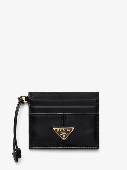 Prada Logo-Plaque Leather Card Holder in Black, front — The Quiet Edition
