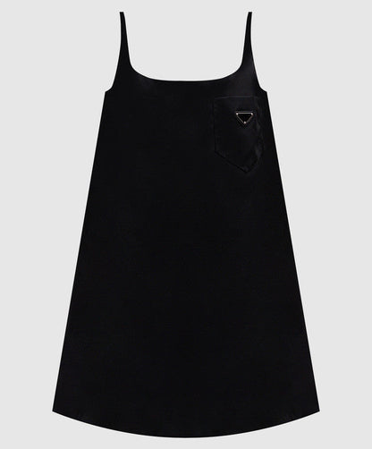 Prada Re-Nylon sleeveless dress in black, back view on model — The Quiet Edition