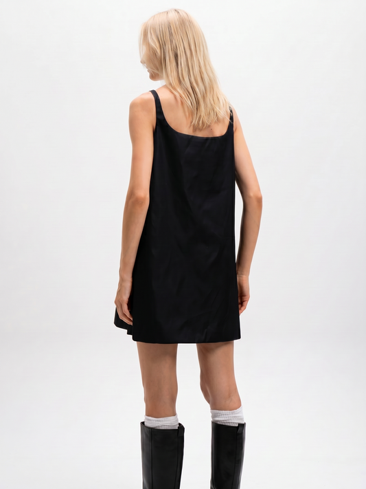 Prada Re-Nylon sleeveless dress in black, front view on model — The Quiet Edition