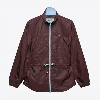 Prada Re-Nylon blouson jacket in burgundy, front view — The Quiet Edition