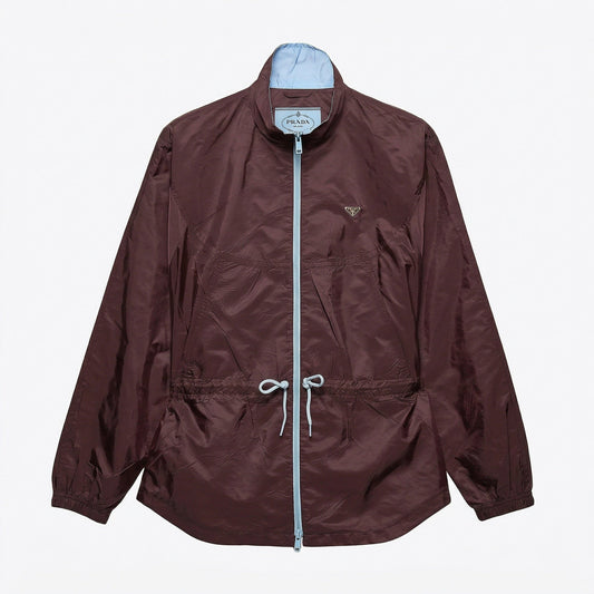 Prada Re-Nylon blouson jacket in burgundy, front view — The Quiet Edition