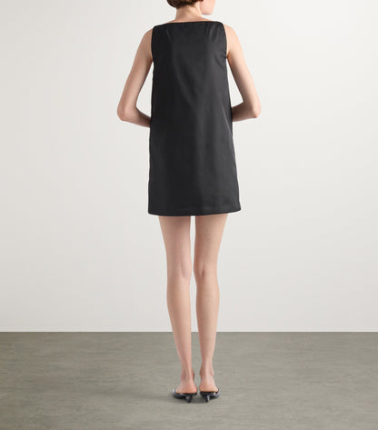 Prada Re-Nylon Buckle-Detail Mini Dress in Black, worn back view — The Quiet Edition