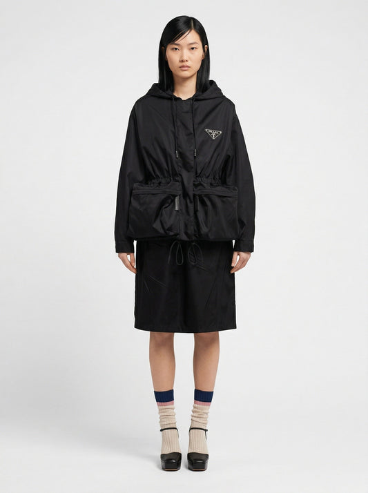 Prada Re-Nylon hooded jacket in black, model front — The Quiet Edition