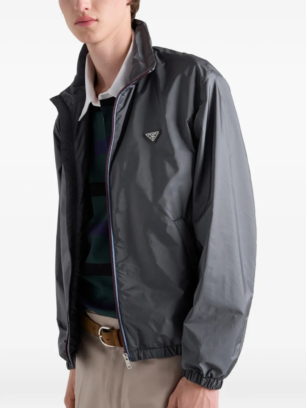 Prada Re-Nylon Jacket in grey, worn side view — The Quiet Edition