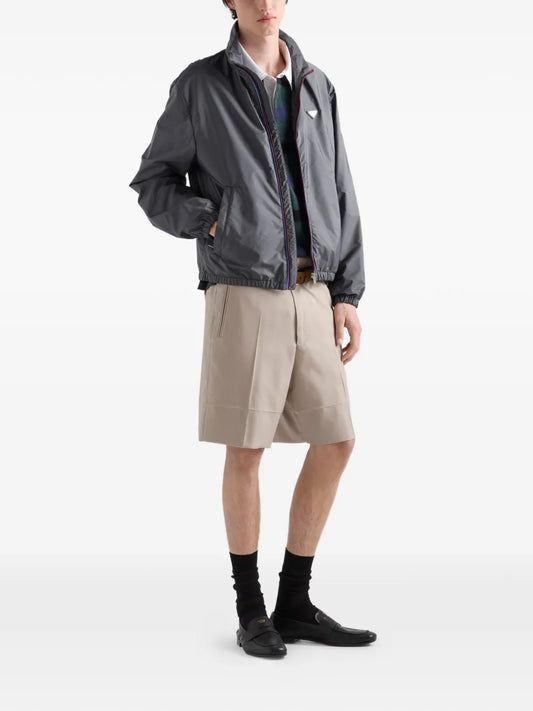 Prada Re-Nylon Jacket in grey, worn front view — The Quiet Edition