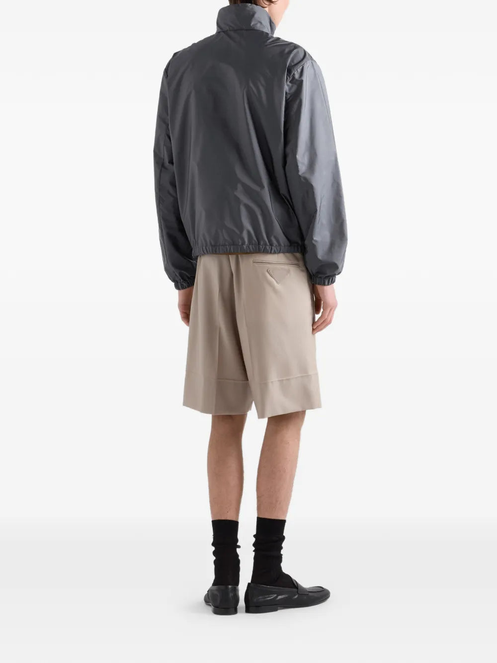 Prada Re-Nylon Jacket in grey, worn back view — The Quiet Edition