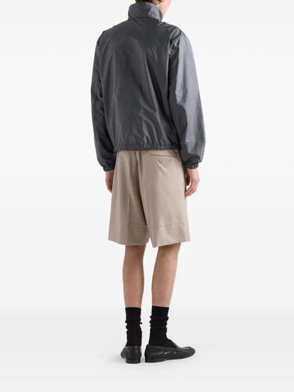 Prada Re-Nylon Jacket in grey, worn back view — The Quiet Edition