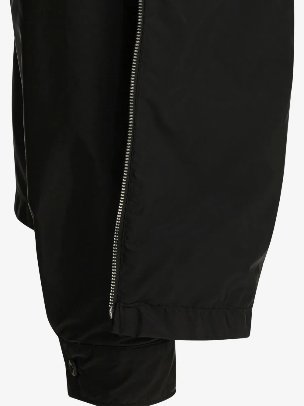Prada Re-Nylon Zipper Shirt detail, silver front zip meeting the elasticated hem and buttoned cuff
