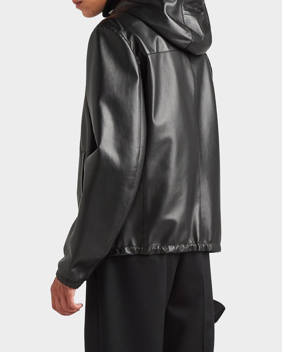 Prada reversible nappa leather and Re-Nylon jacket, back view on model, leather side out with hood down