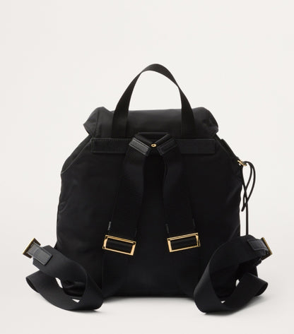 Prada Small Re-Edition 1978 Backpack in Black, side — The Quiet Edition