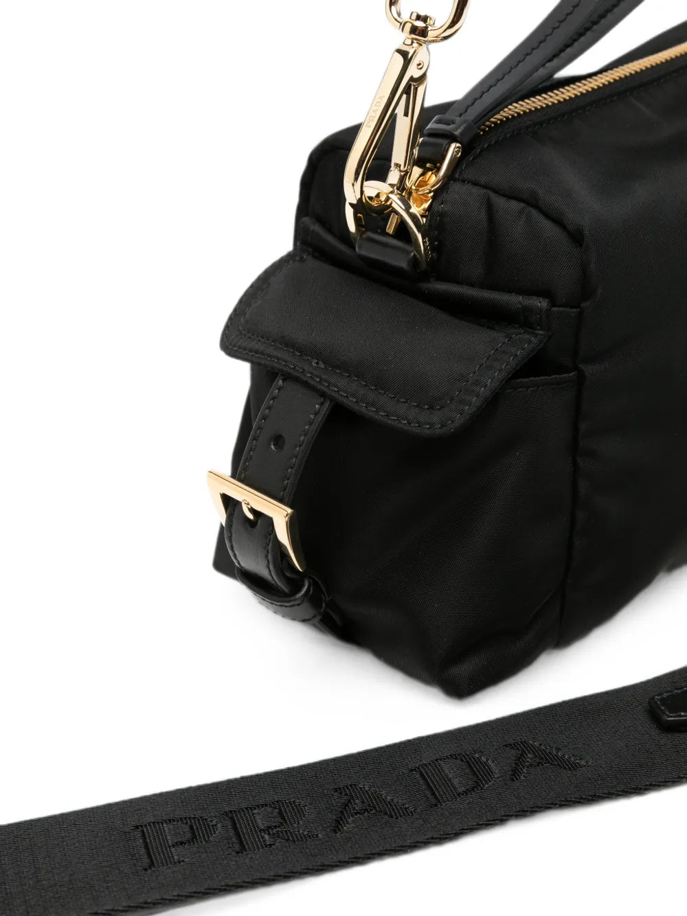 Prada Small Re-Nylon Shoulder Bag in black, side flap pocket and buckle detail — The Quiet Edition
