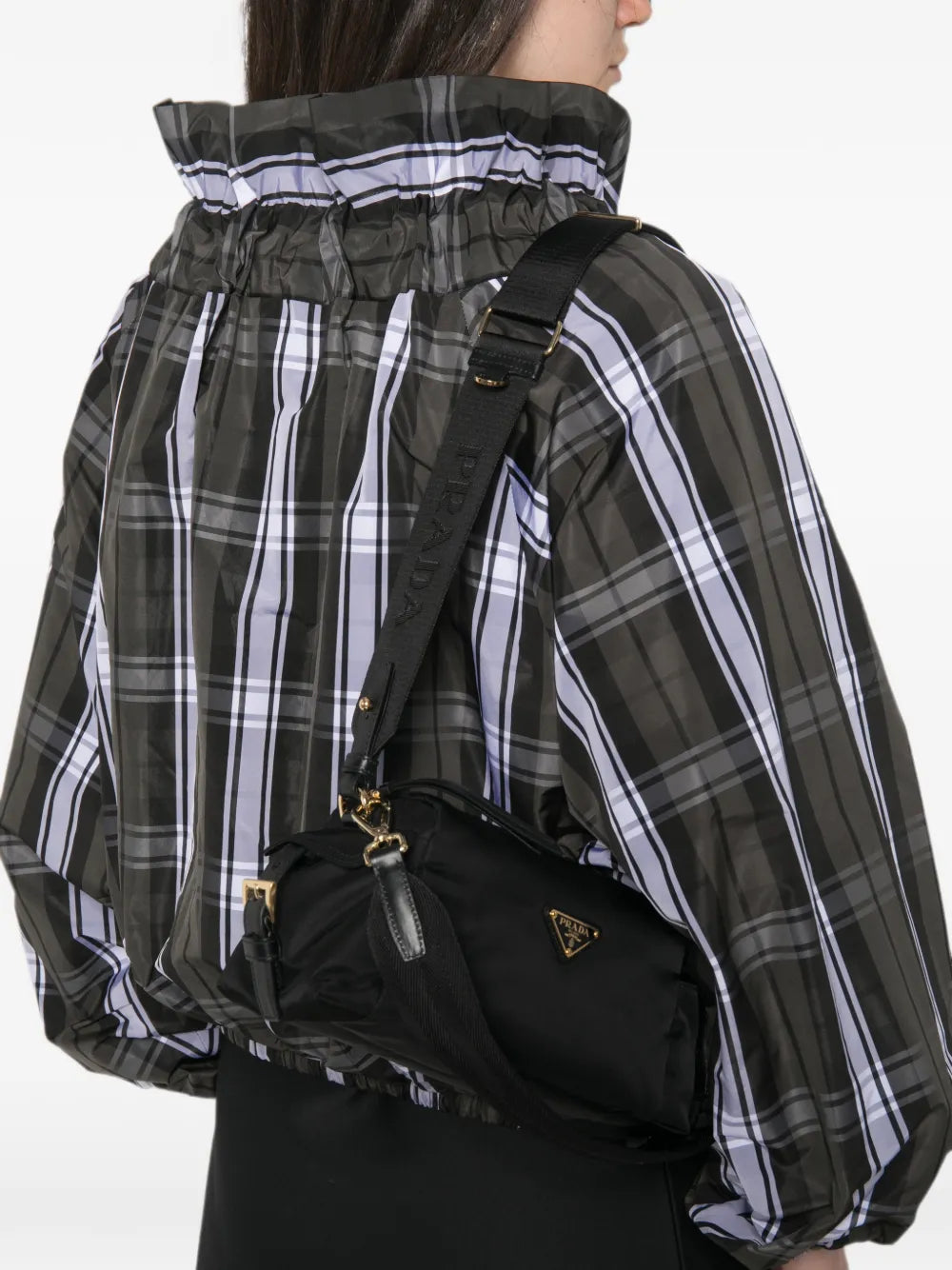 Prada Small Re-Nylon Shoulder Bag in black, worn crossbody — The Quiet Edition