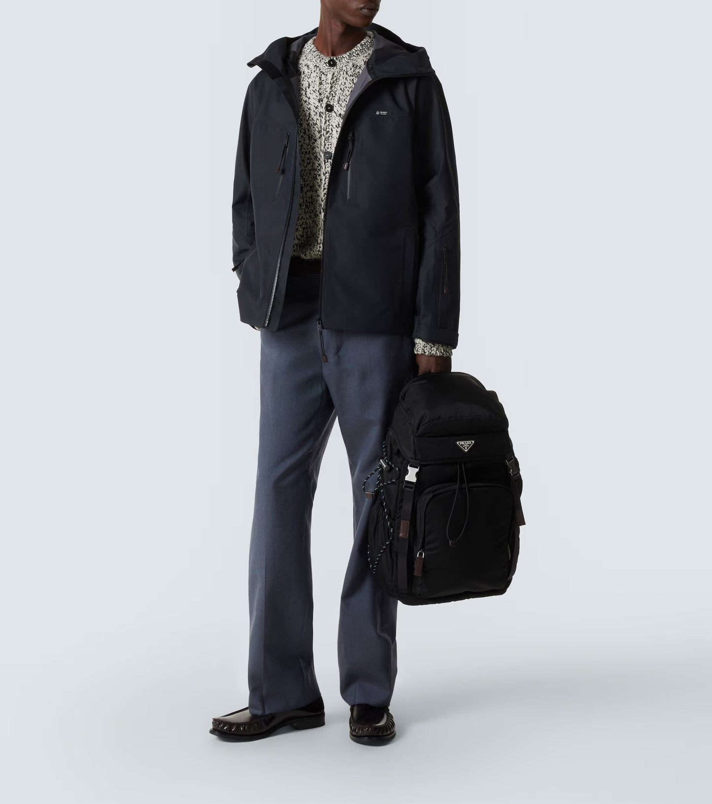 Prada Speedrock Re-Nylon backpack in black, model styled view — The Quiet Edition