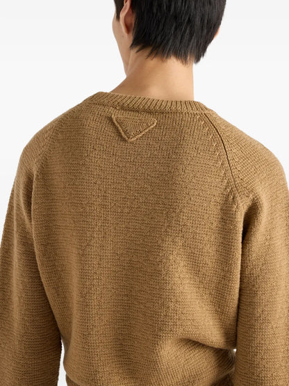 Prada Wool Crew-Neck Sweater in Camel, worn back view with triangle logo — The Quiet Edition