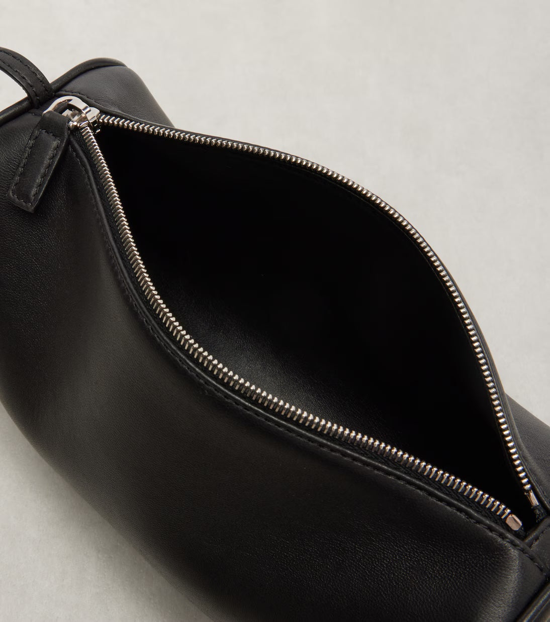 The Row '90s leather shoulder bag in black, interior view — The Quiet Edition