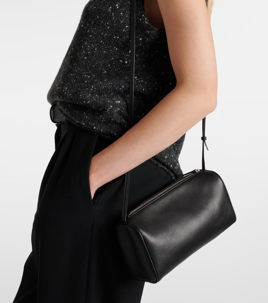 The Row '90s leather shoulder bag in black, model crossbody view — The Quiet Edition