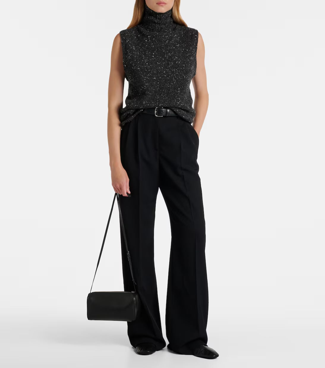 The Row '90s leather shoulder bag in black, model full styled view — The Quiet Edition
