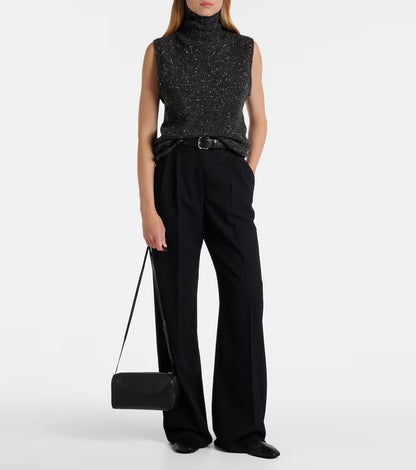 The Row '90s leather shoulder bag in black, model full styled view — The Quiet Edition