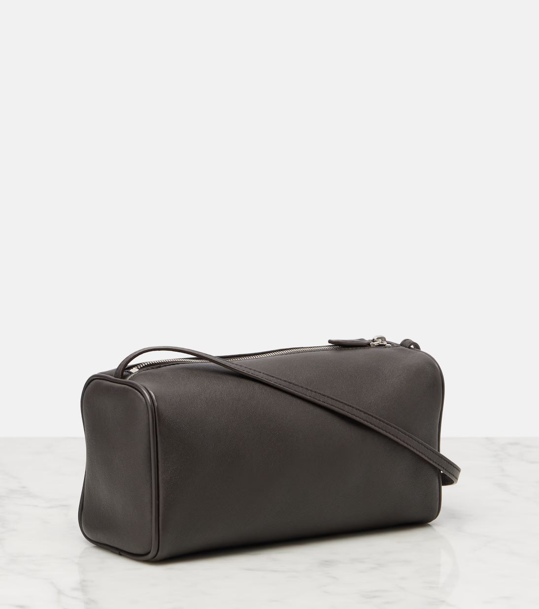 The Row '90s leather shoulder bag in brown, upright angle view — The Quiet Edition