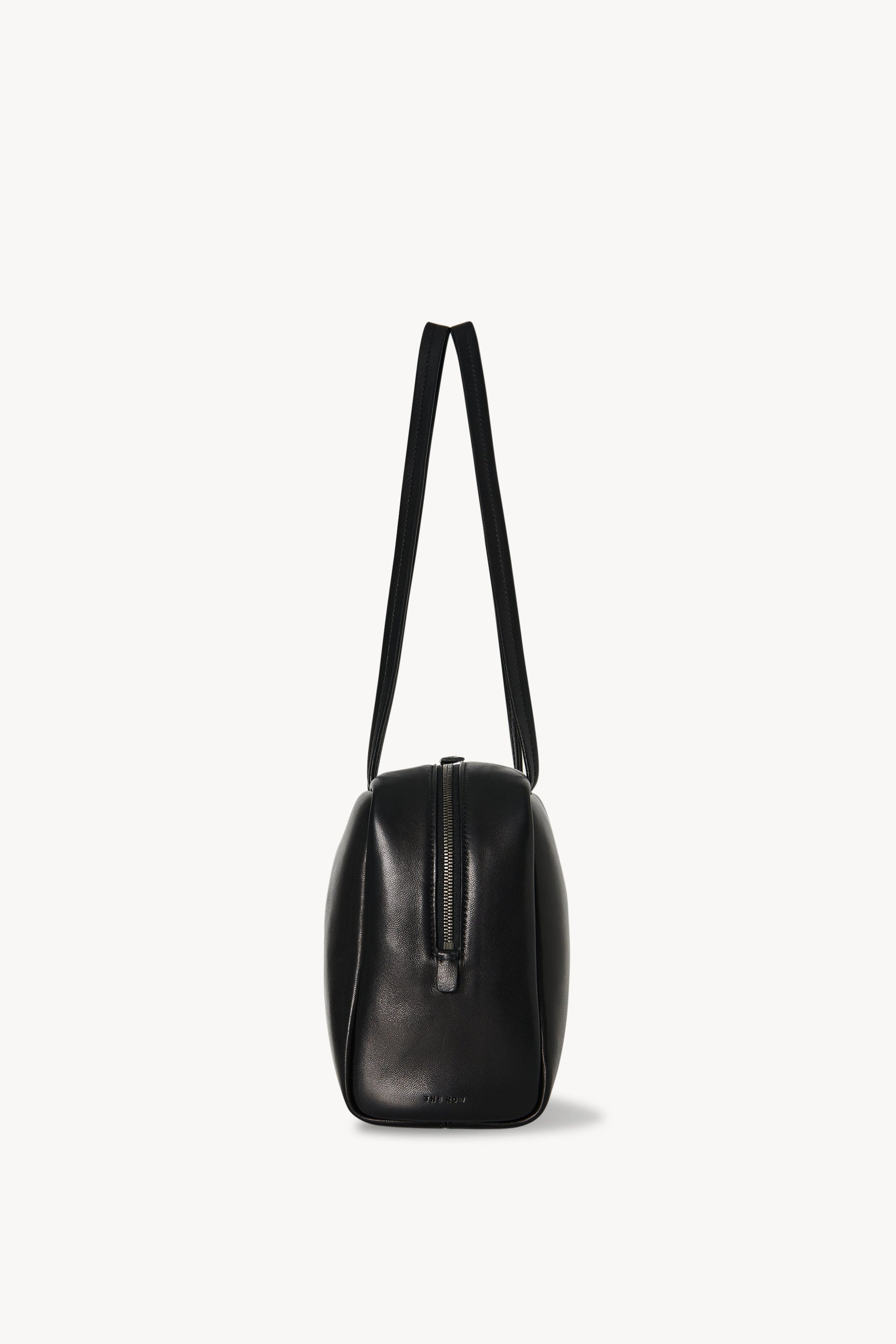 The Row Astra Bowling Bag in Black, side — The Quiet Edition