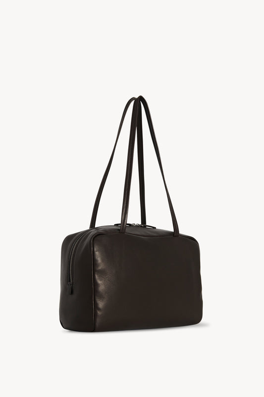 The Row Astra Bowling Bag in Dark Brown, back — The Quiet Edition