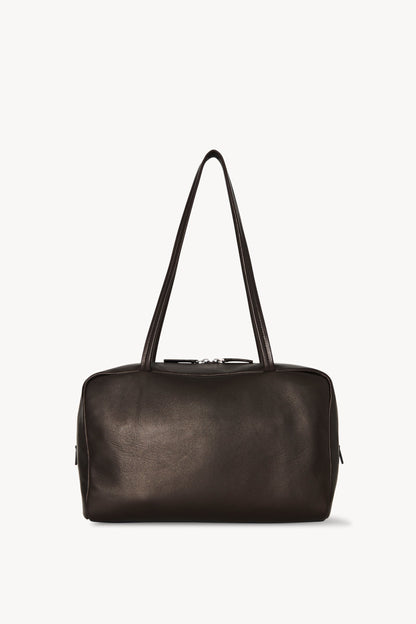 The Row Astra Bowling Bag in Dark Brown, front — The Quiet Edition