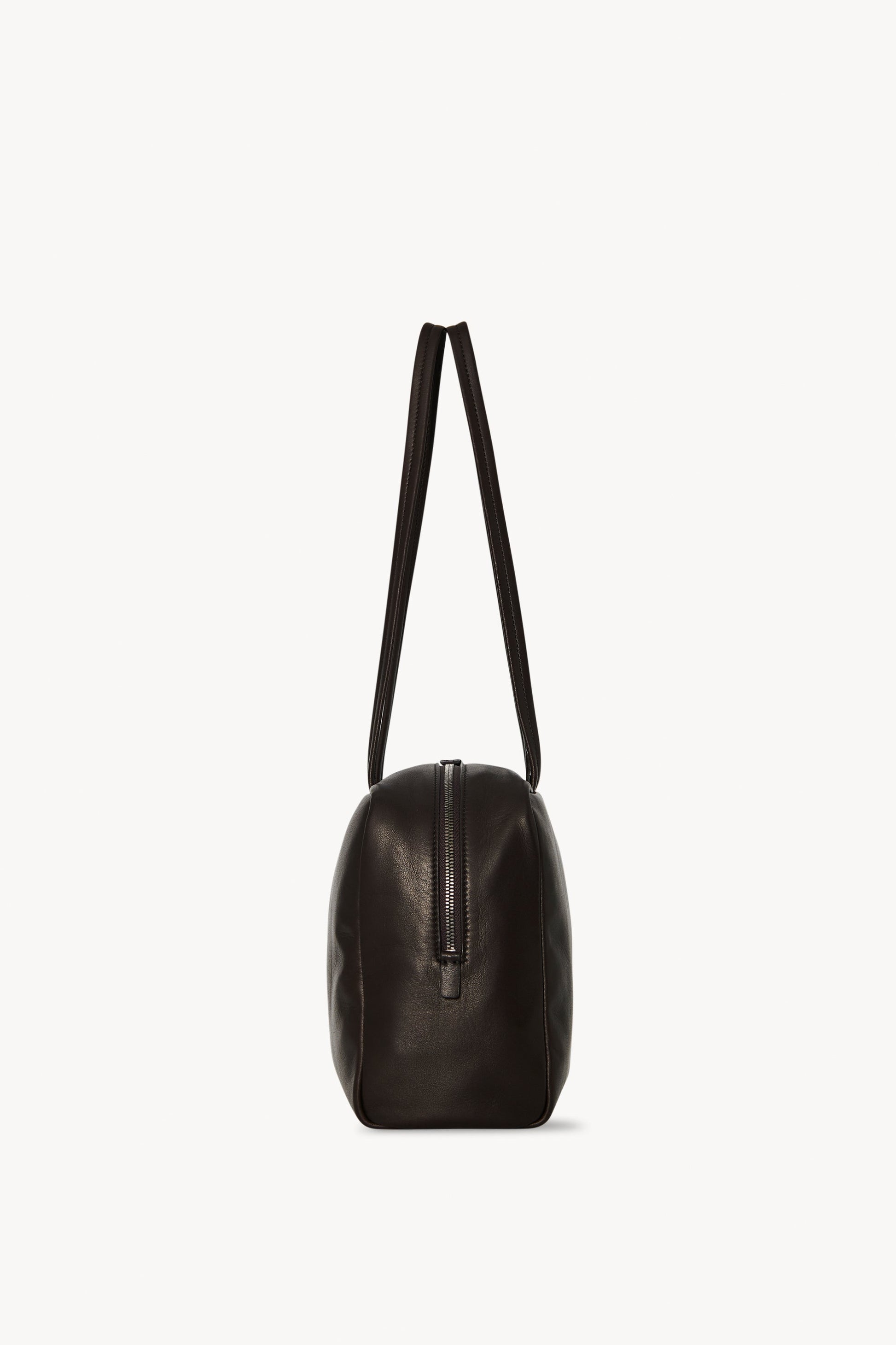 The Row Astra Bowling Bag in Dark Brown, side — The Quiet Edition