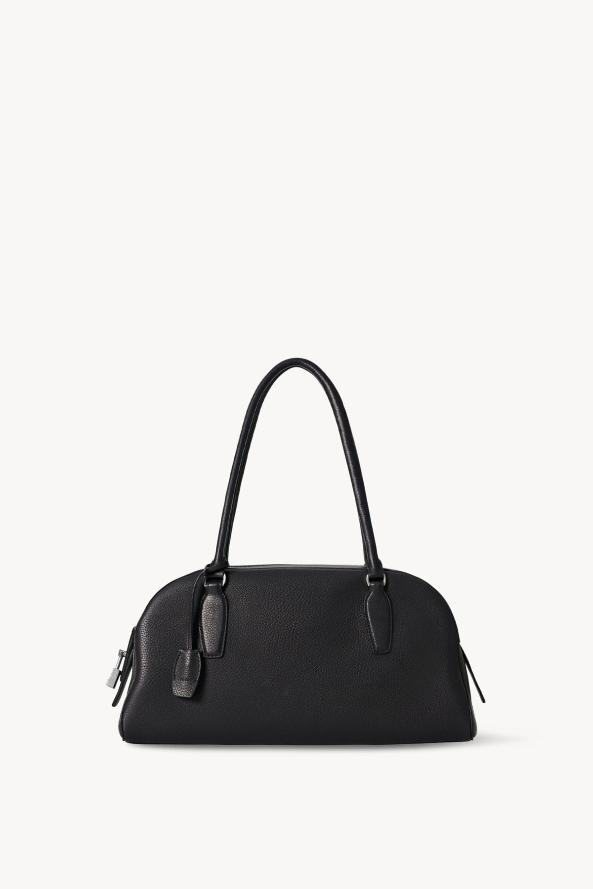 The Row E/W India Bag in black grained calfskin, front view with tubular handles and side padlock
