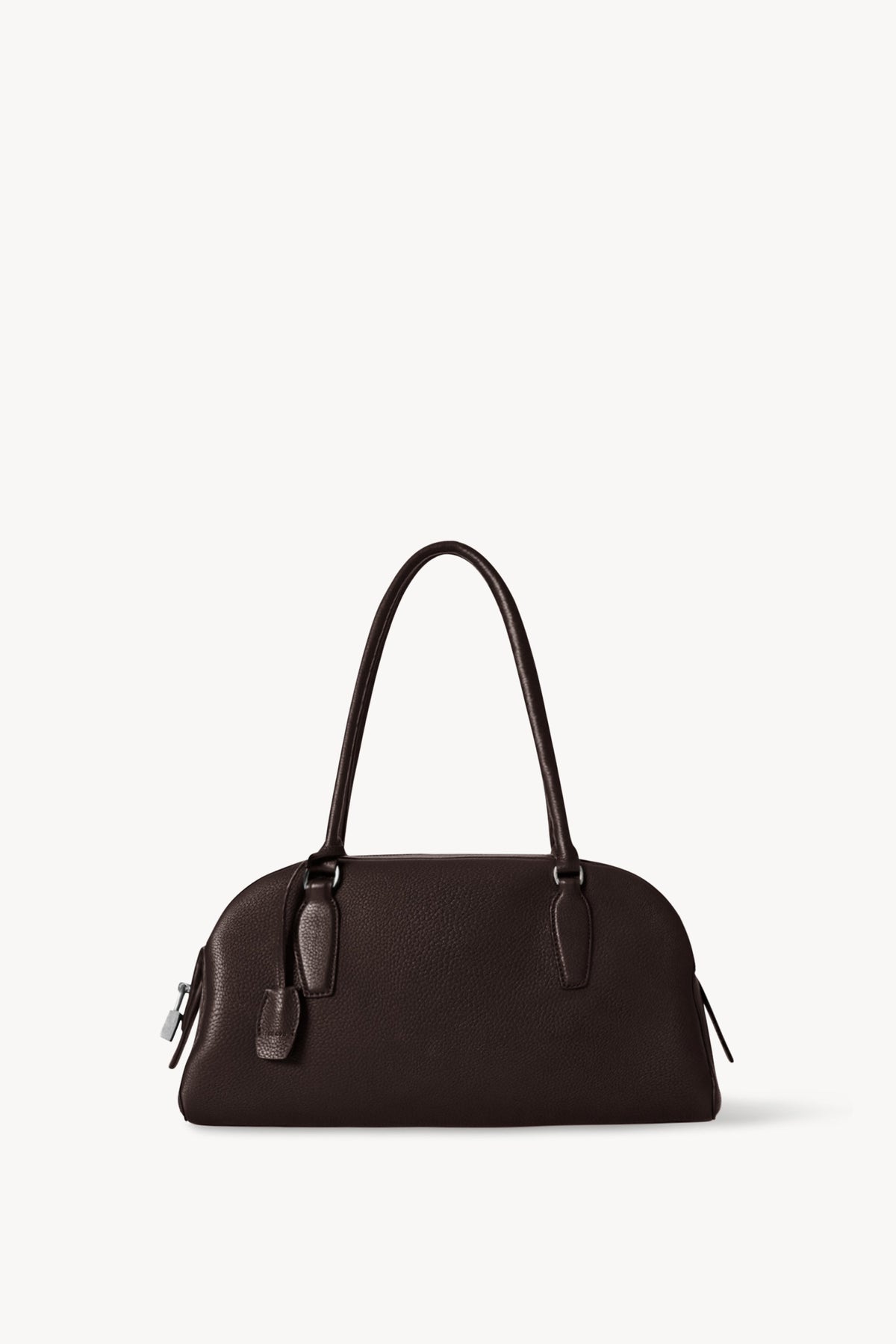 The Row E/W India Bag in dark brown grained calfskin, front view with extended tubular handles