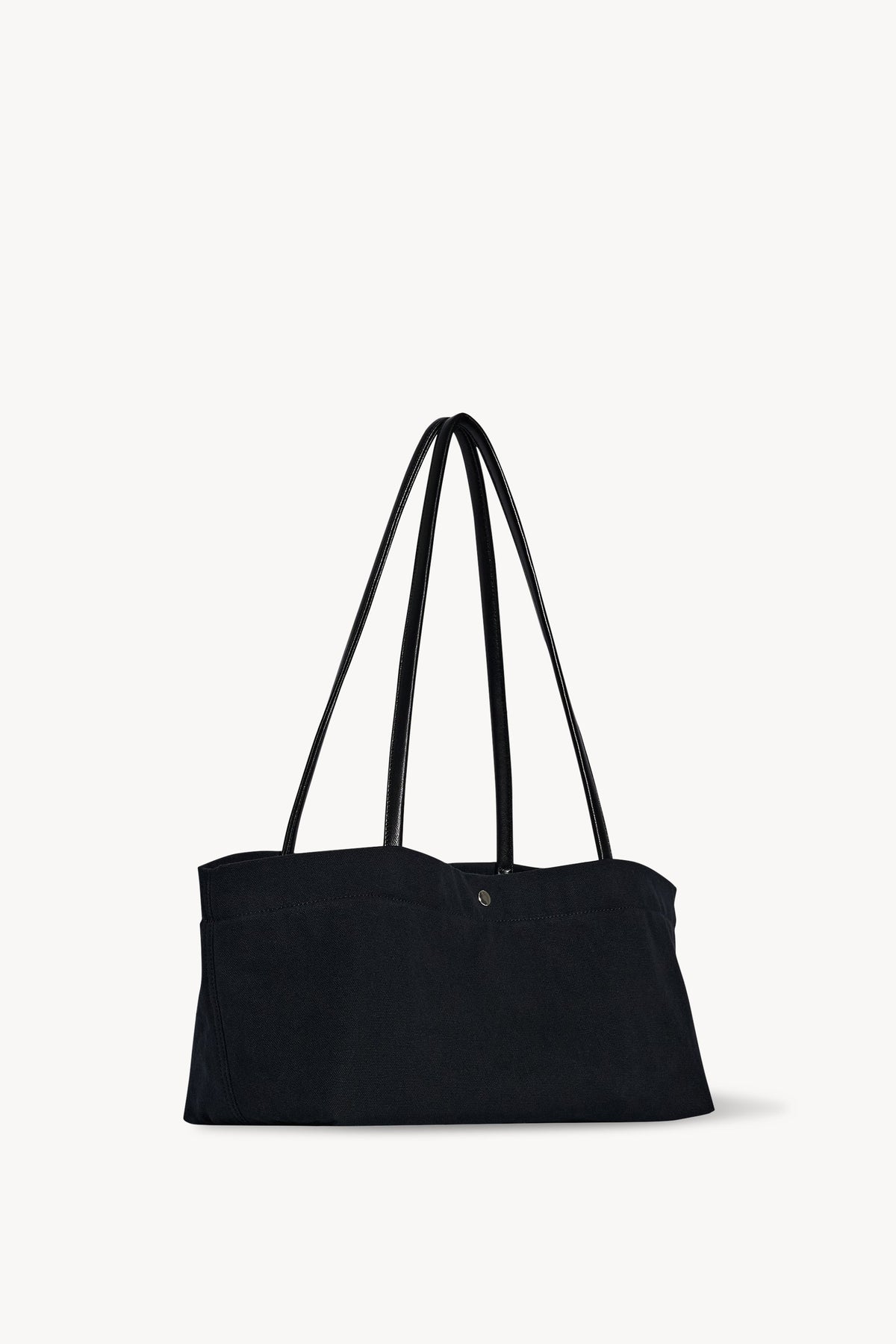 The Row Idaho Shoulder Bag in Black, three-quarter angle view — The Quiet Edition