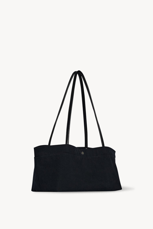 The Row Idaho Shoulder Bag in Black, three-quarter angle view — The Quiet Edition