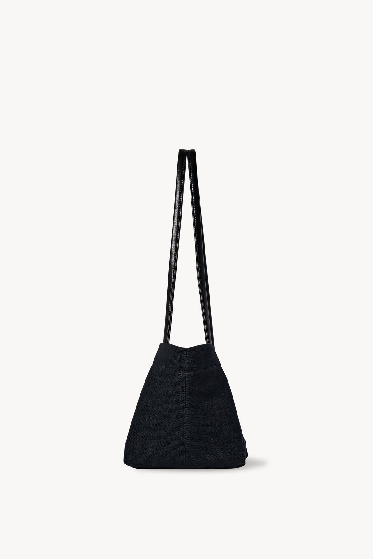 The Row Idaho Shoulder Bag in Black, side view — The Quiet Edition